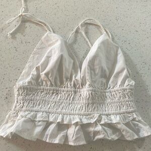 Cute women’s summertime top - size L but runs small in my opinion - more like M